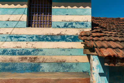 Staircase of building against blue sky