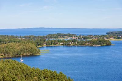 Sailboat on the water in a beautiful archipelago at karlsborg city in sweden 