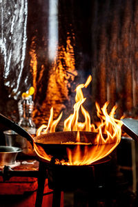 Close-up of fire on barbecue grill