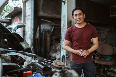 Portrait of young man riding motorcycle