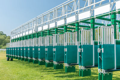 Open gates at horse racing field