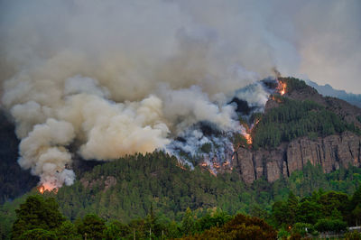 Mountain ablaze with forest fire.