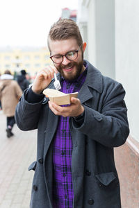 Young man using mobile phone