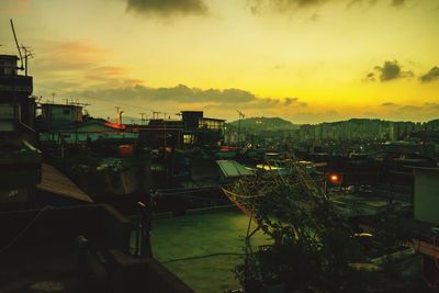 Silhouette of city at sunset