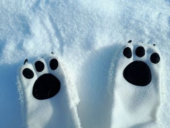 Close-up of smiley face against sky