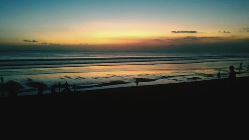 Scenic view of sea at sunset