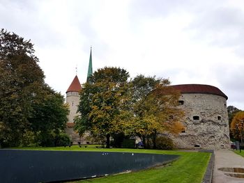 View of historical building against cloudy sky