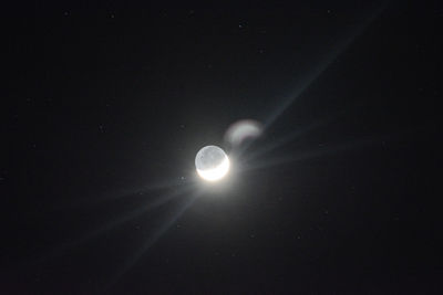 Scenic view of moon against sky at night