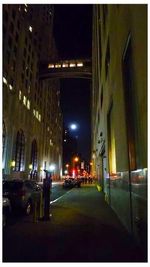 Illuminated buildings in city at night