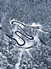 High angle view of winding road during winter