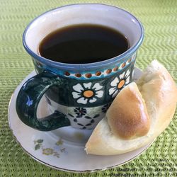 High angle view of coffee cup on table