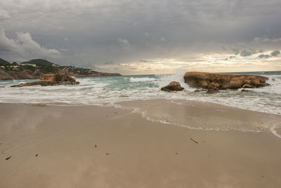 Scenic view of beach against sky