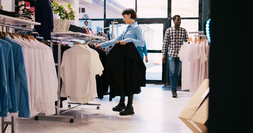 Low section of woman standing in store