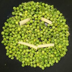 High angle view of grapes in container