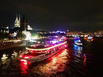 Illuminated buildings in city at night