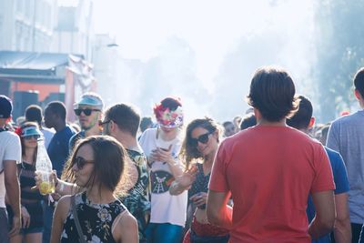 Group of people in town square