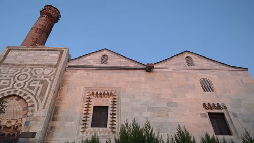 Low angle view of historic building against clear sky