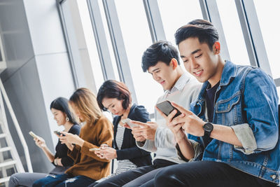 Young man using smart phone