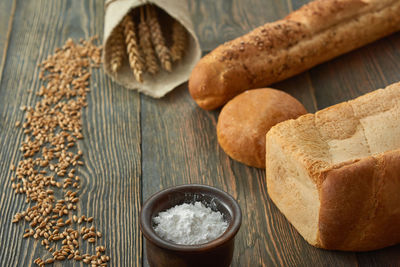 High angle view of bread on cutting board