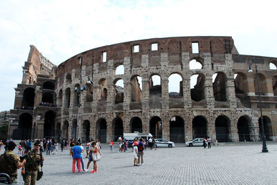 Group of people in front of historical building