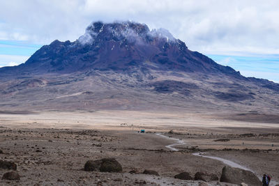 Scenic view of jagged snowcapped mountains against sky on kilimanjaro