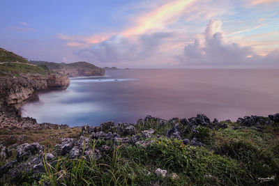 Scenic view of sea against sky during sunset