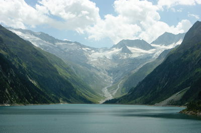 Scenic view of mountains and lake against sky