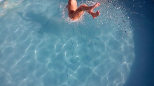 Woman swimming in water