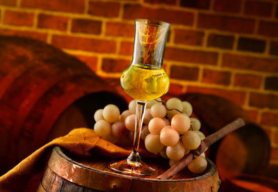 Close-up of wine in glass on table
