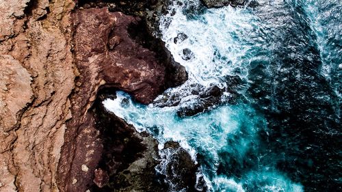 Close-up of rock in sea