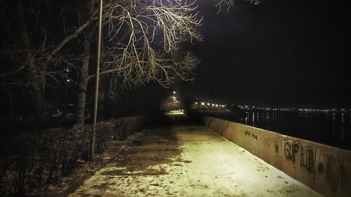 Illuminated street lights at night