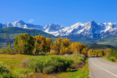 Scenic view of snowcapped mountains against clear sky