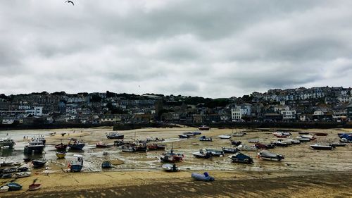 High angle view of townscape against cloudy sky