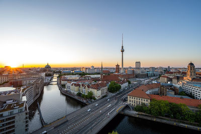 The center of berlin with the famous tv tower at sunset