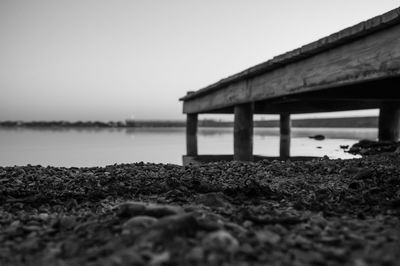 Surface level of bridge against clear sky