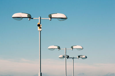 Low angle view of street light against sky