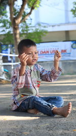 Cute boy looking at camera