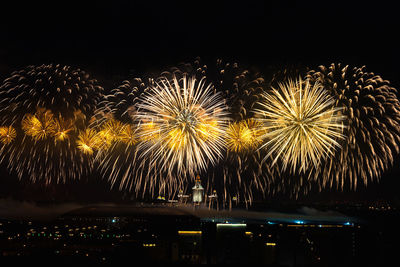 Firework display at night