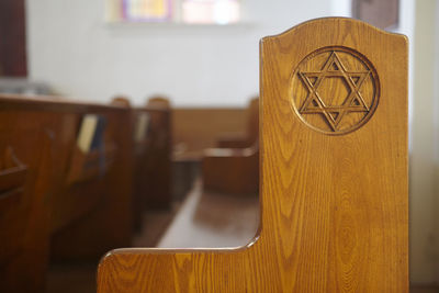 Star symbol on pew at church