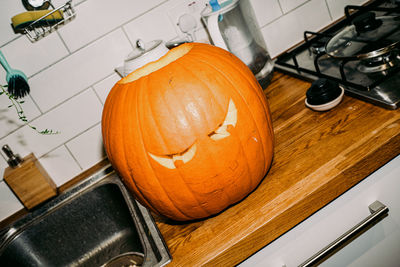 High angle view of jack o lantern on table