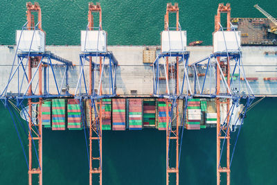 High angle view of sailboats moored in sea