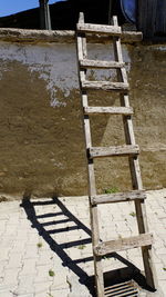 High angle view of ladder on wall