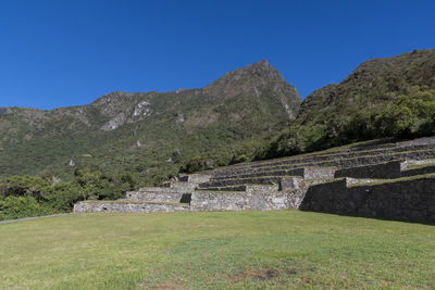 Stone wall with mountain in background