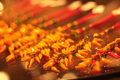 Close-up of tomatoes on barbecue grill