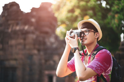 Man photographing with camera