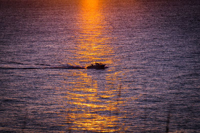 Reflection of sky in sea during susunrise 