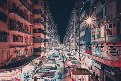 Illuminated buildings in city at night