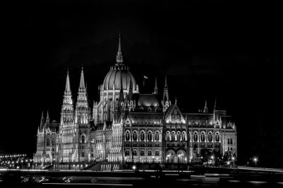 Low angle view of illuminated building at night