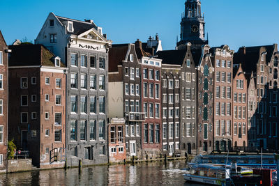 Oude kerk by buildings in city