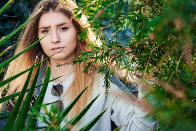 Portrait of young woman outdoors